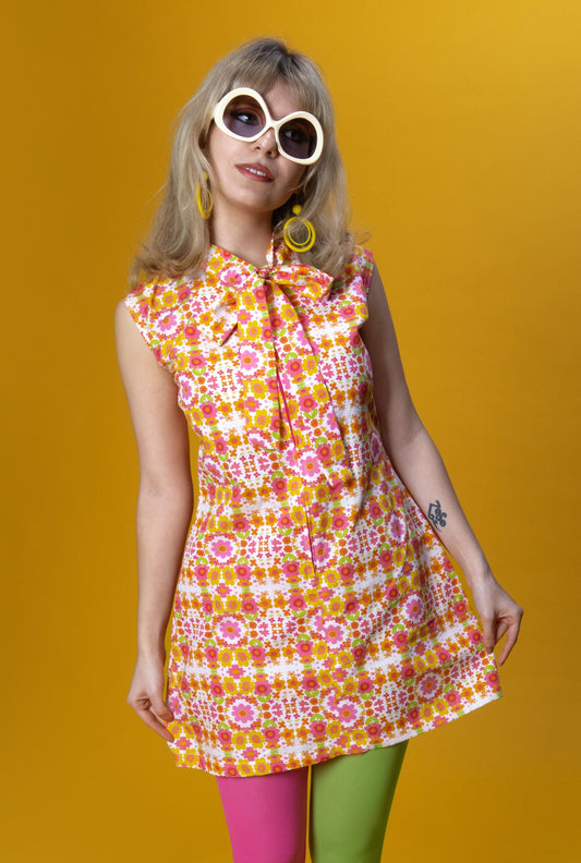 The Daisy Trail Bow Mini Dress